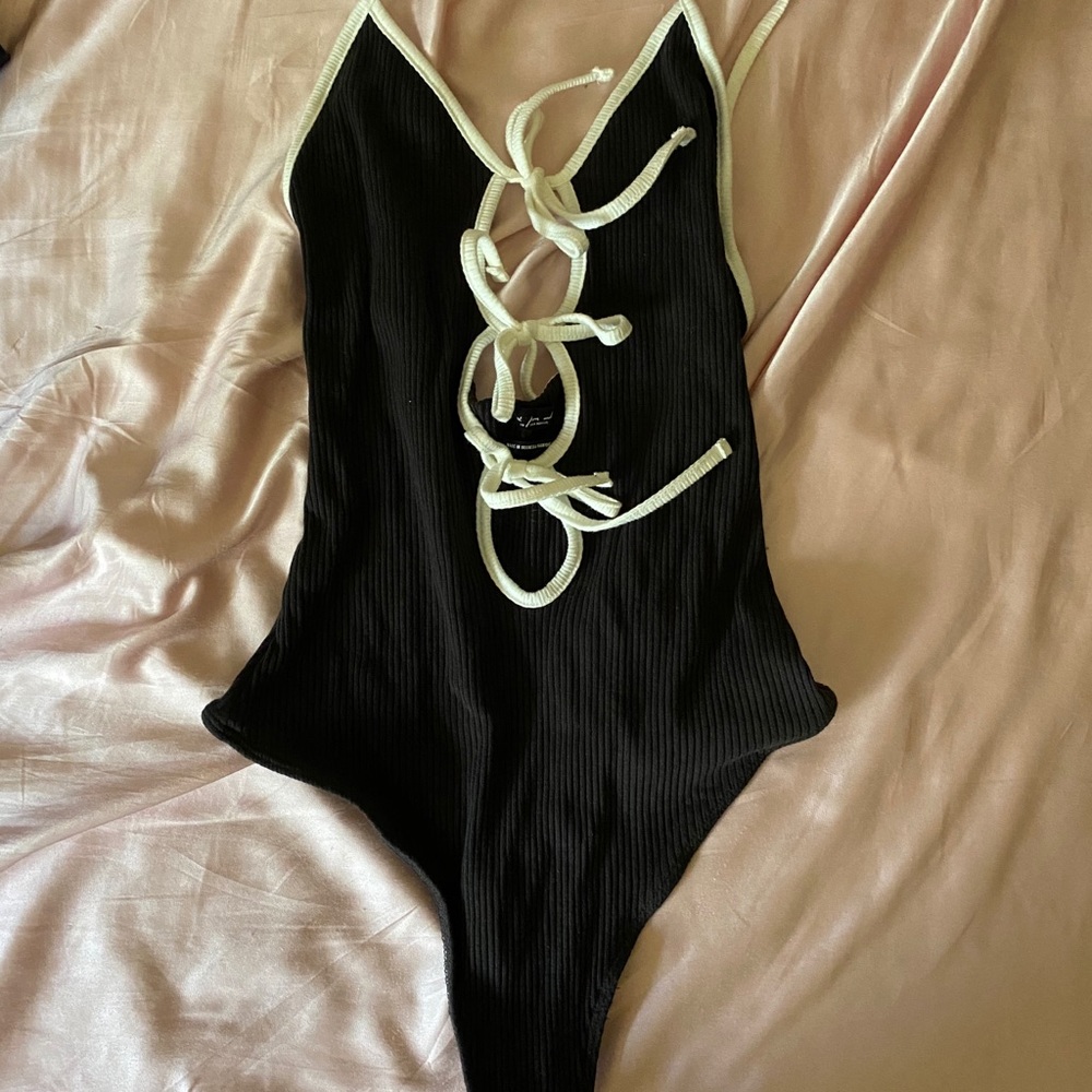 Out from under bodysuit